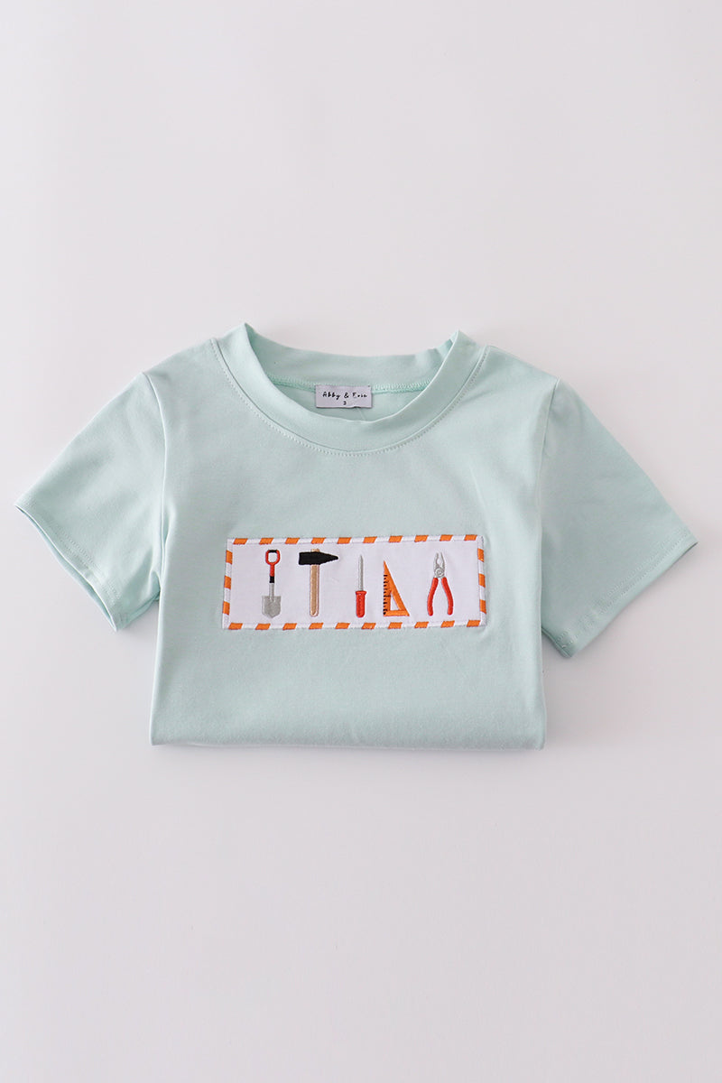 Abby & Evie
Blue tool embroidery top