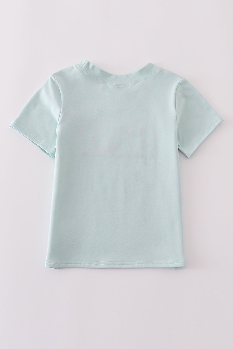 Abby & Evie
Blue tool embroidery top