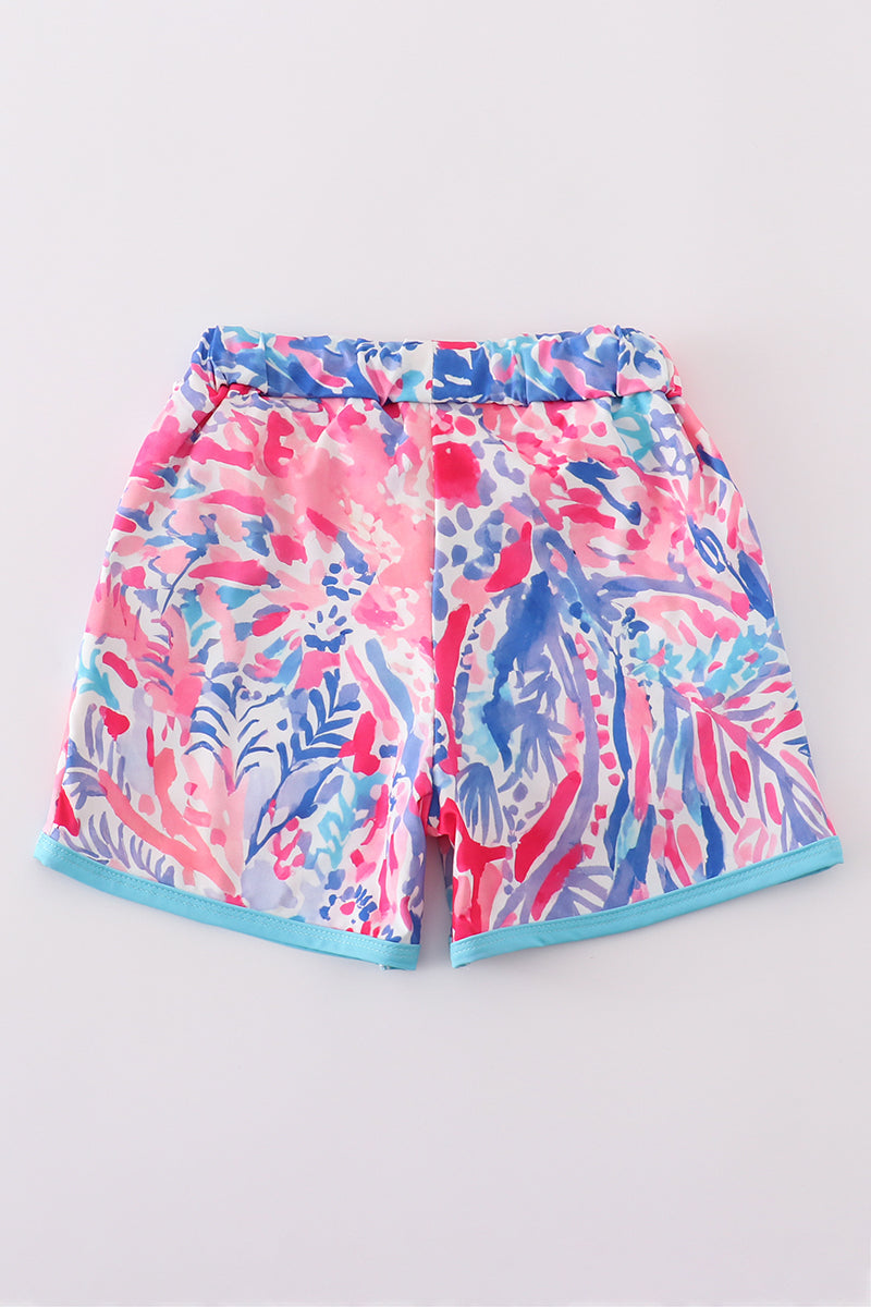 Abby & Evie
Tropical Sunset Waves swim trunks