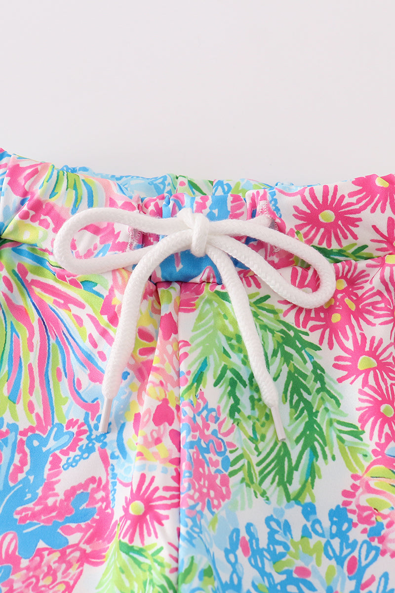 Abby & Evie
Pink tropical boy swim trunk