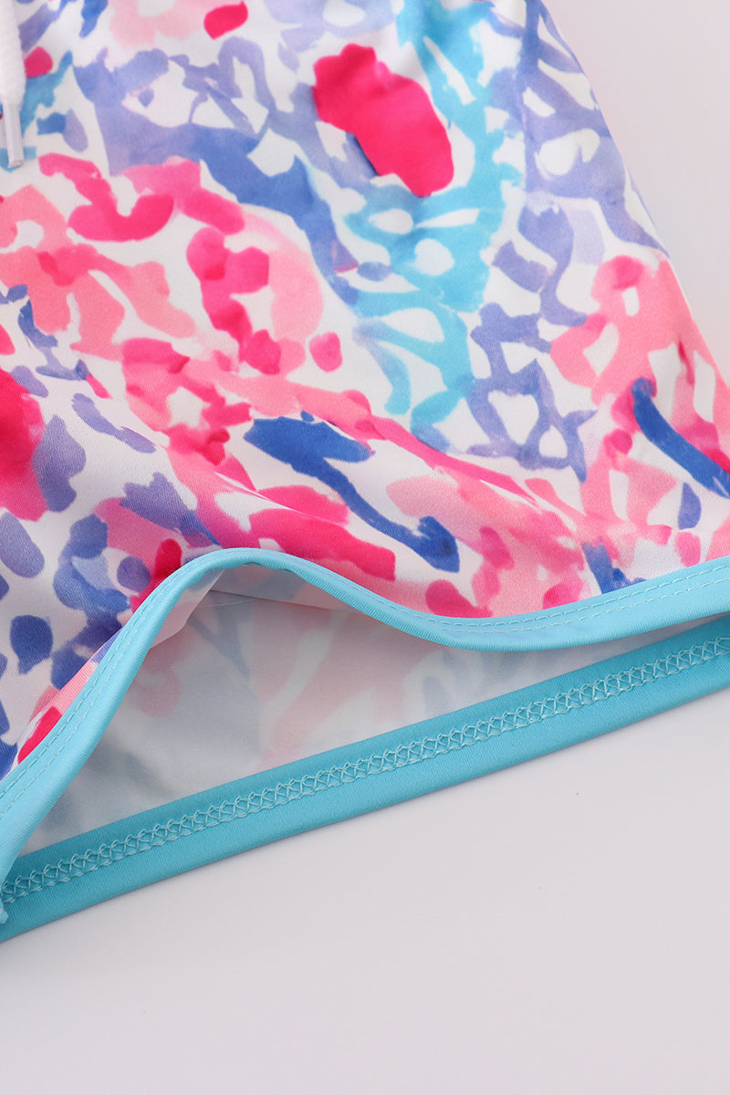 Abby & Evie
Tropical Sunset Waves swim trunks