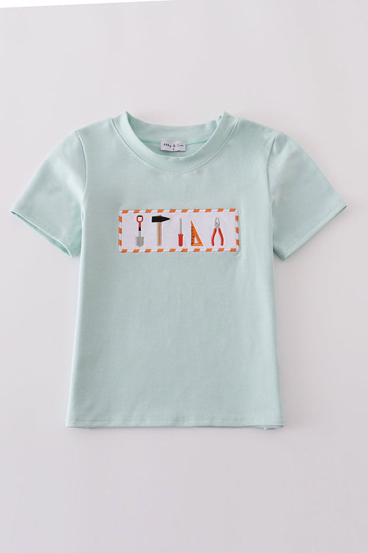 Abby & Evie
Blue tool embroidery top