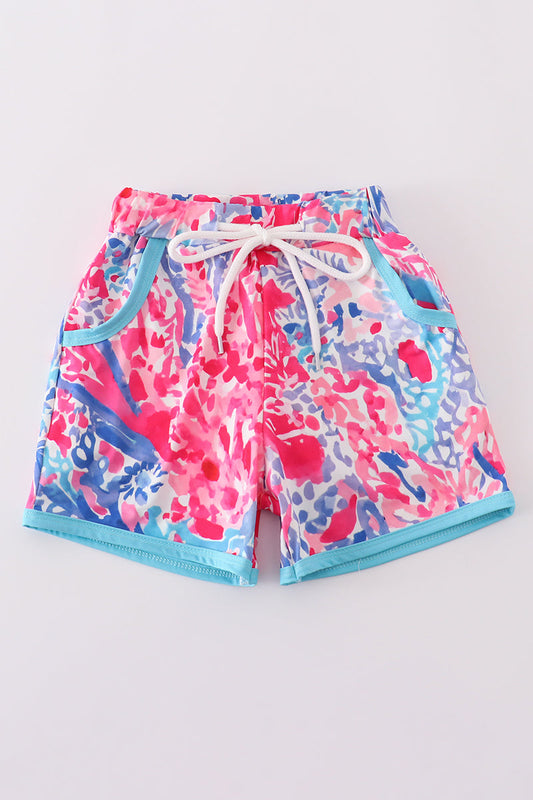 Abby & Evie
Tropical Sunset Waves swim trunks