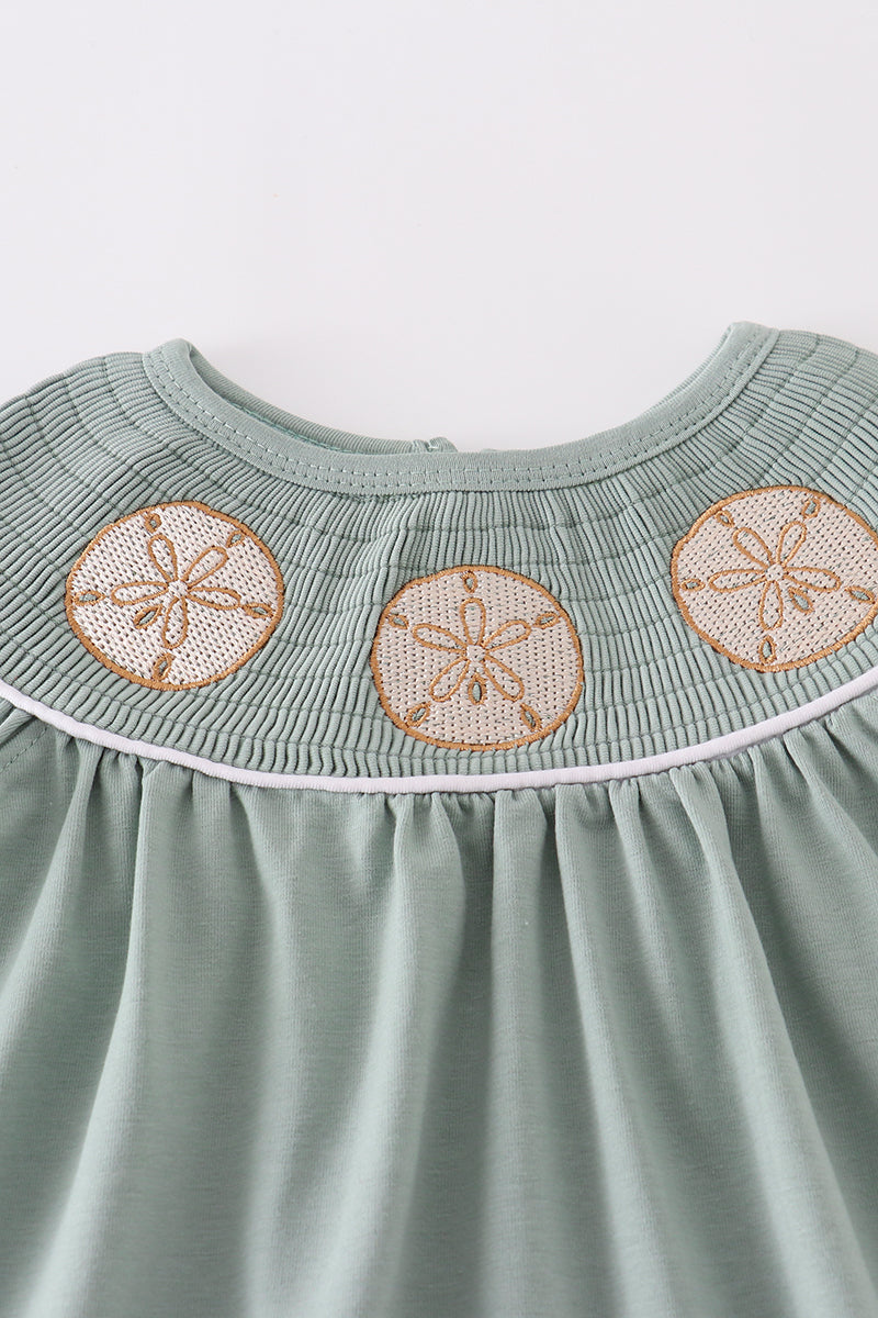 Abby & Evie
Sage sand dollar embroidery smocked girl dress